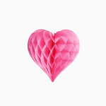 Foglio di carta rosa pastello a nido d'ape.