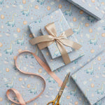 Papel de Regalo 70 cm x 2 m Dino Baby Azul Pastel