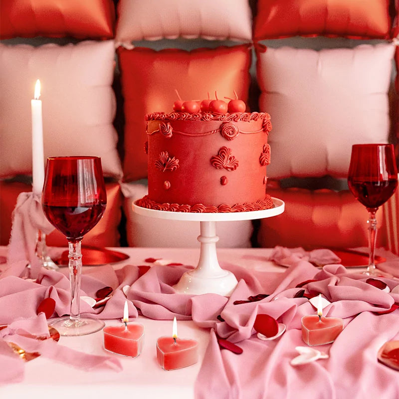 Velas vermelhas em formato de coração