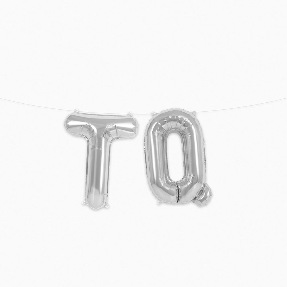 Palloncino con lettera TQ in lamina d'argento